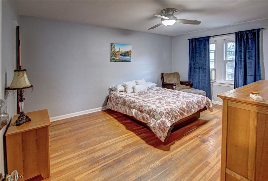 17800 Winslow Road Beachwood, OH 44122 - Photo 13 of 31 Bedroom with light hardwood / wood-style floors and ceiling fan