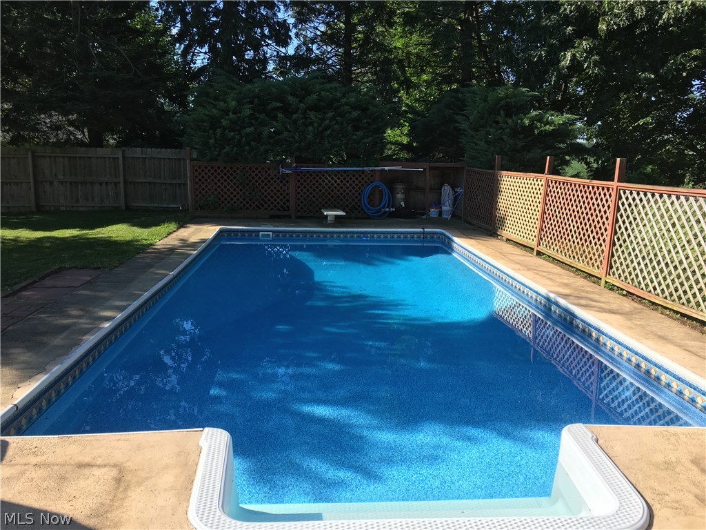 1207 Lake Road Conneaut, OH 44030 - Photo 5 of 33 Fenced in backyard with a great pool for family fun and entertaining.