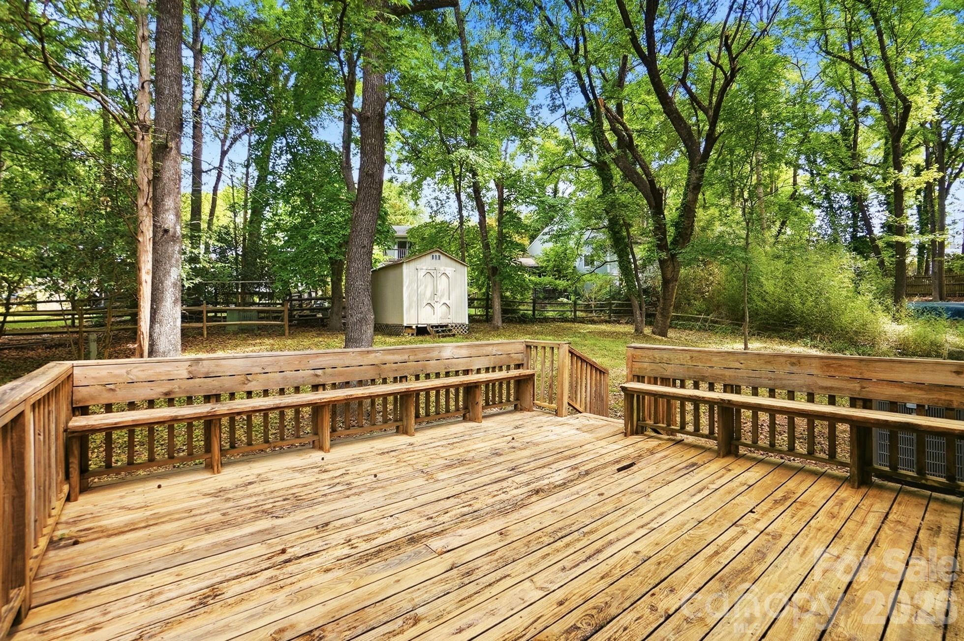 5060 Suwarrow Circle Tega Cay, SC 29708 - Photo 27 of 34 a view of balcony with deck and trees