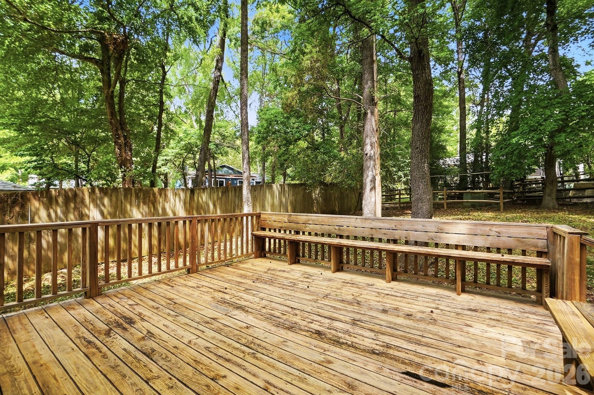 5060 Suwarrow Circle Tega Cay, SC 29708 - Photo 28 of 34 a view of balcony with wooden floor and fence