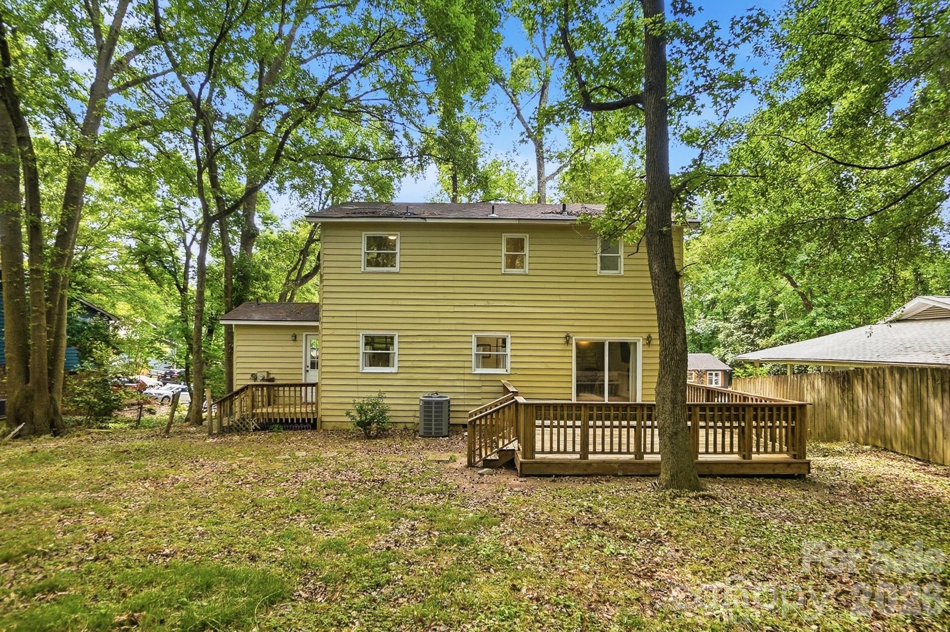 5060 Suwarrow Circle Tega Cay, SC 29708 - Photo 30 of 34 a view of a house with a yard