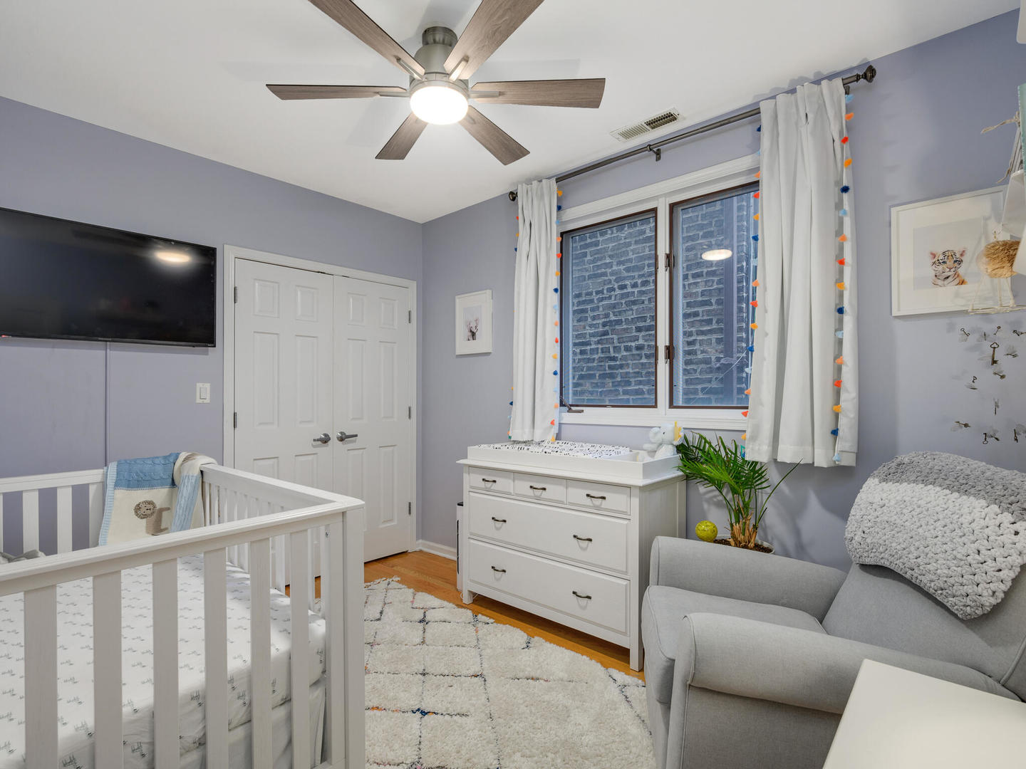 1012 North Wood Street, Unit 2 Chicago, IL 60622 - Photo 14 of 21 a living room with furniture and a flat screen tv