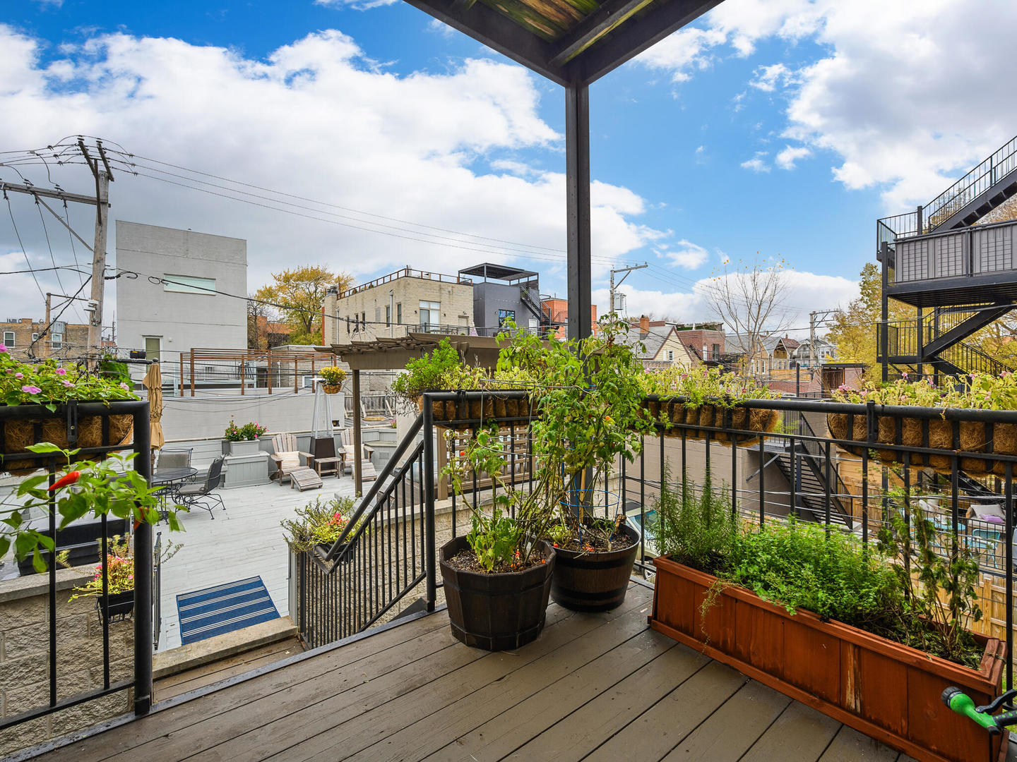1012 North Wood Street, Unit 2 Chicago, IL 60622 - Photo 16 of 21 a view of a balcony with chairs