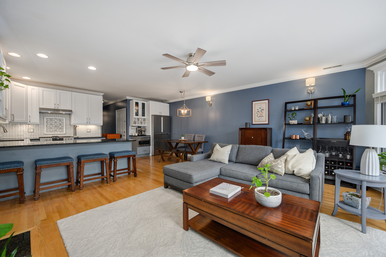 1012 North Wood Street, Unit 2 Chicago, IL 60622 - Photo 3 of 21 a living room with furniture and a wooden floor