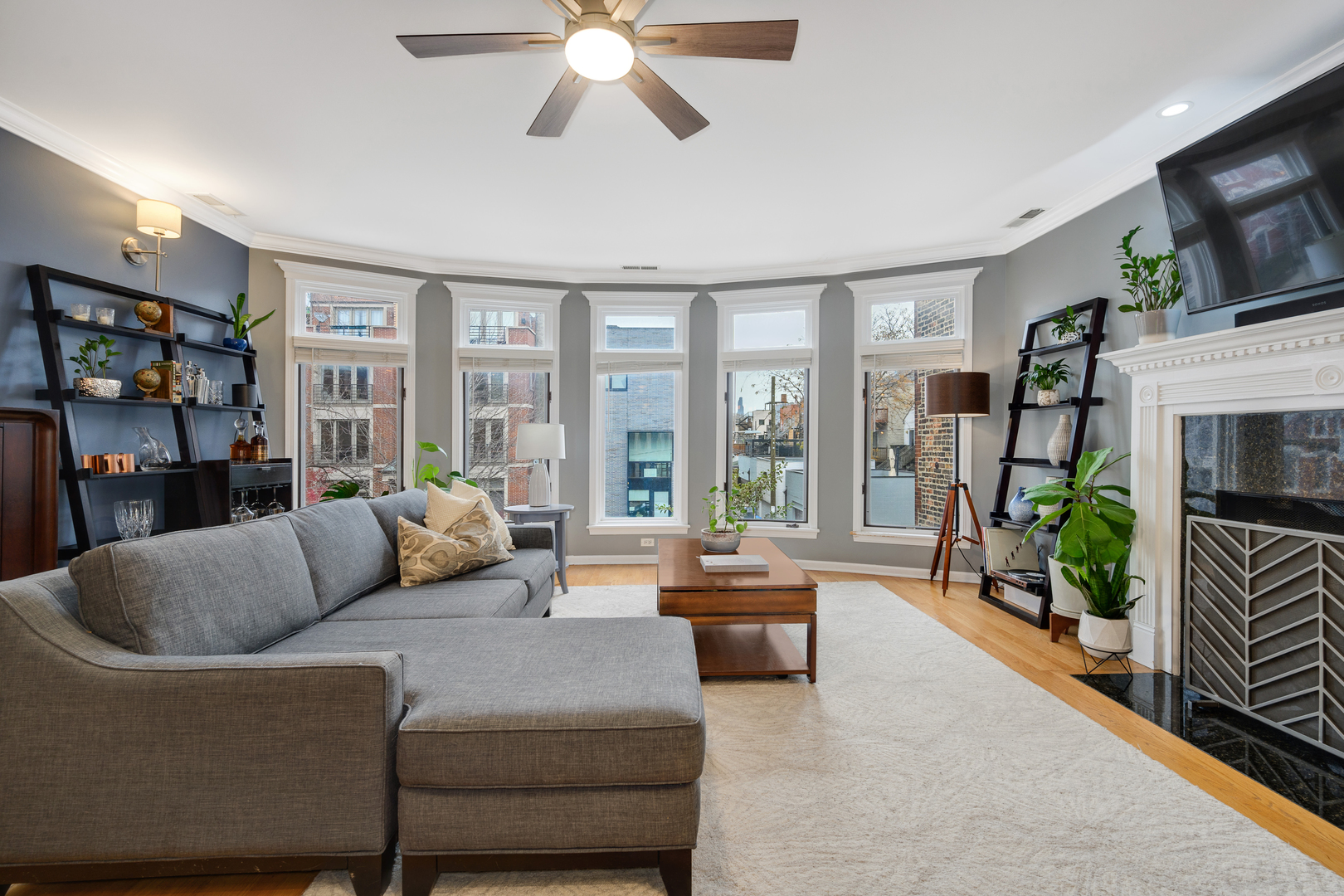 1012 North Wood Street, Unit 2 Chicago, IL 60622 - Photo 5 of 21 a living room with furniture and a flat screen tv