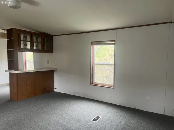 an empty room with windows