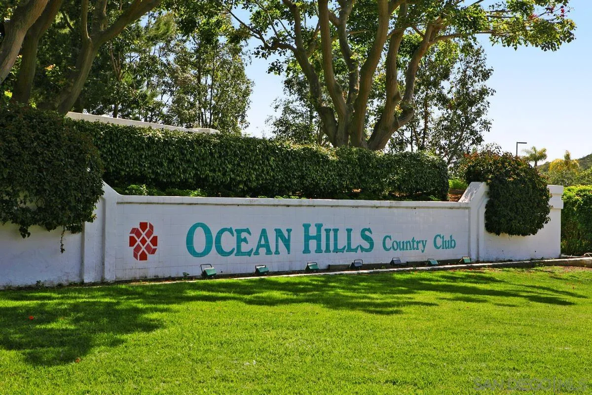 6027 Dassia Way Oceanside, CA 92056 - Photo 45 of 45 a view of outdoor space with sign board and garden