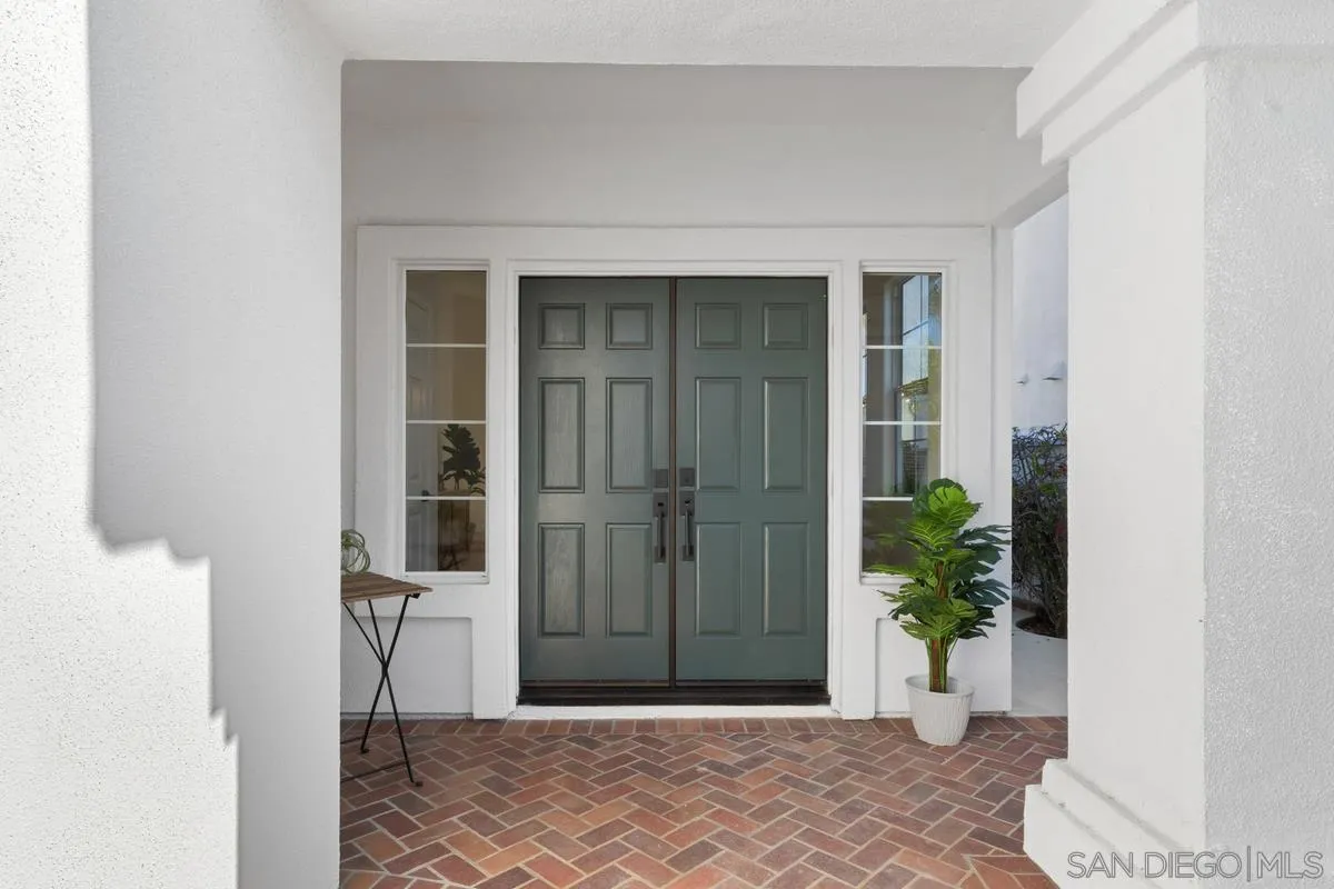 6027 Dassia Way Oceanside, CA 92056 - Photo 6 of 45 a view of entrance with wooden floor