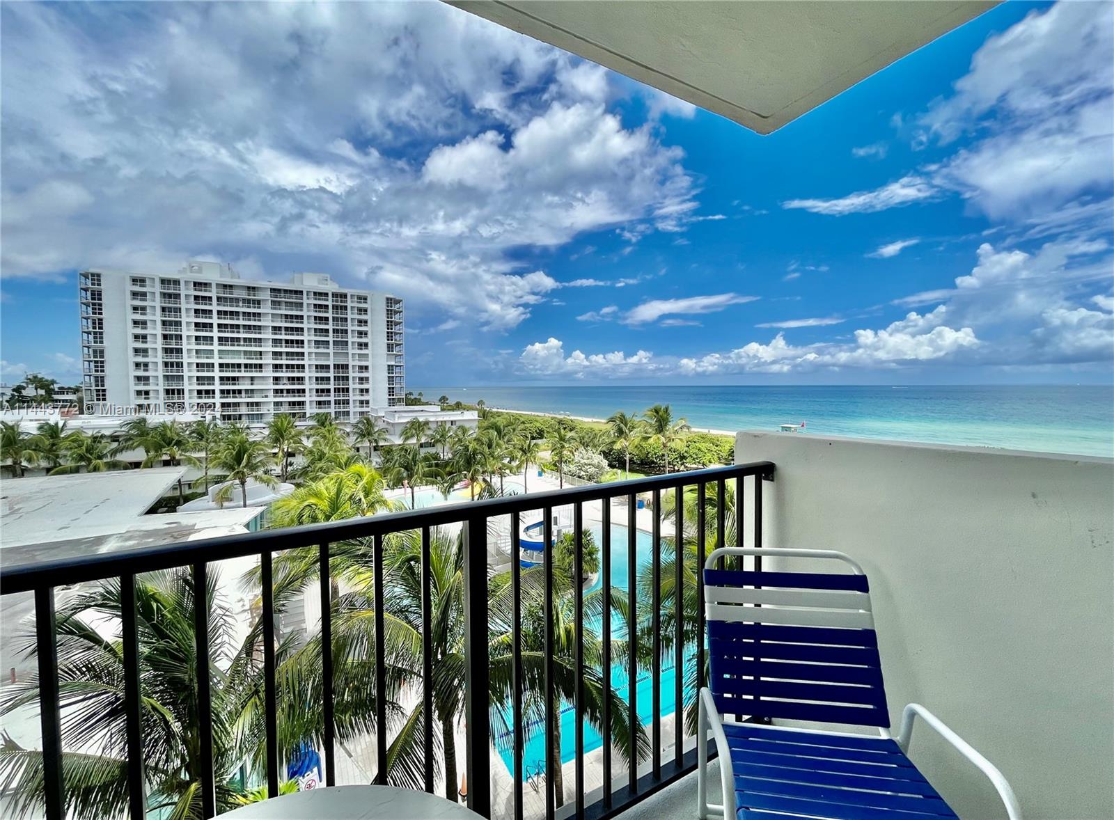 9273 Collins Avenue, Unit 507 Surfside, FL 33154 - Photo 1 of 28 a view of city from a balcony