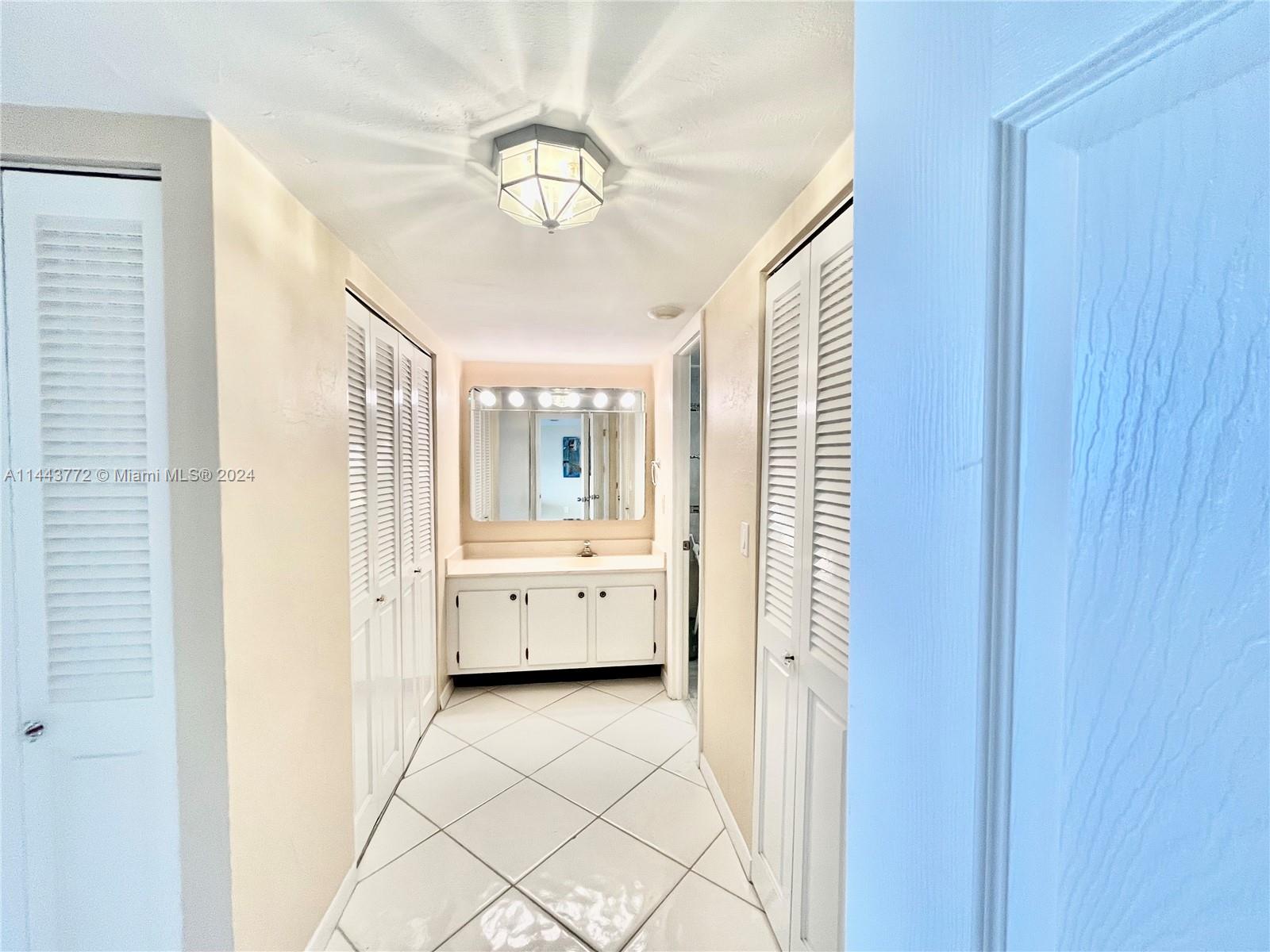 9273 Collins Avenue, Unit 507 Surfside, FL 33154 - Photo 13 of 28 a view of room with natural light