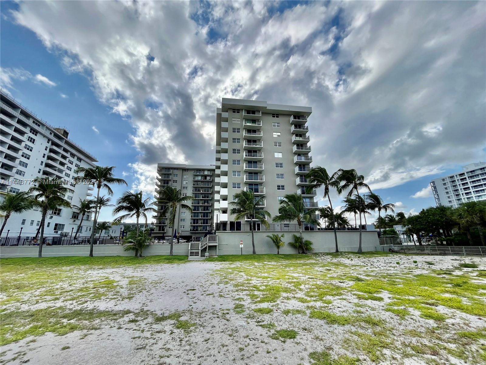 9273 Collins Avenue, Unit 507 Surfside, FL 33154 - Photo 25 of 28 a view of a fountain in front of a house