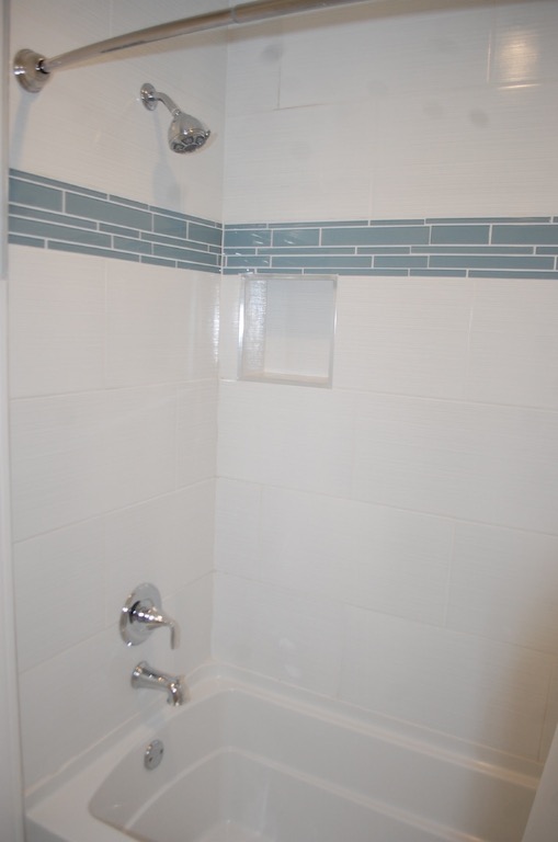 1707 Garden Street, Unit B Austin, TX 78702 - Photo 12 of 33 Full bathroom featuring washtub / shower combination