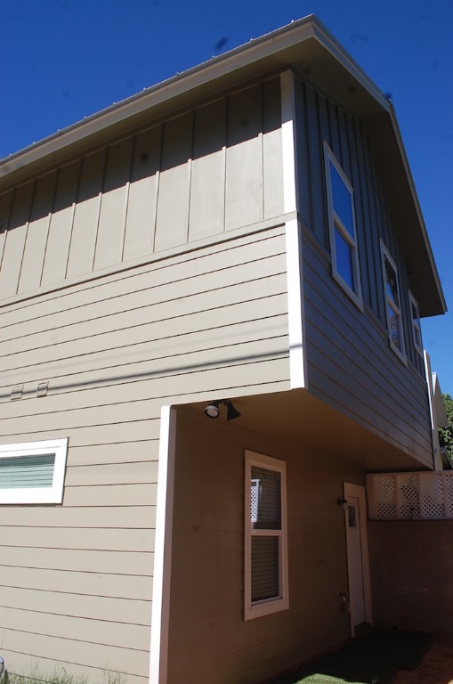 1707 Garden Street, Unit B Austin, TX 78702 - Photo 2 of 33 View of side of home with board and batten siding