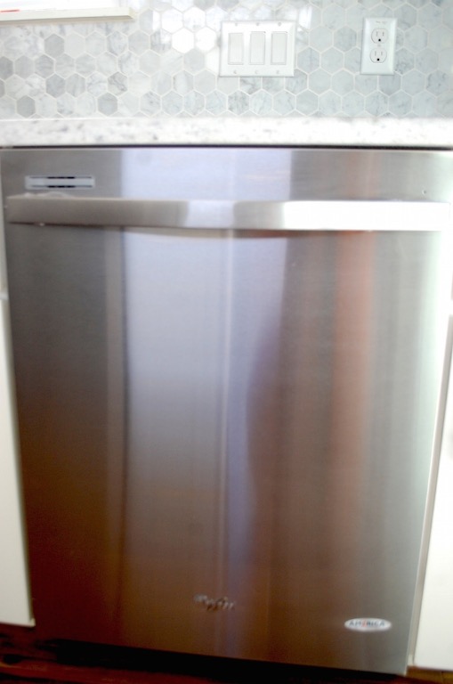 1707 Garden Street, Unit B Austin, TX 78702 - Photo 23 of 33 Kitchen view of stainless steel dishwasher and backsplash