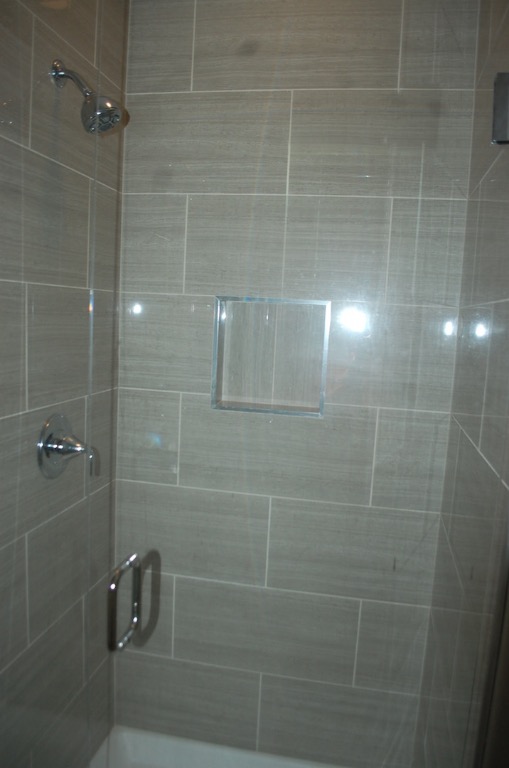 1707 Garden Street, Unit B Austin, TX 78702 - Photo 26 of 33 Bathroom with a tile shower