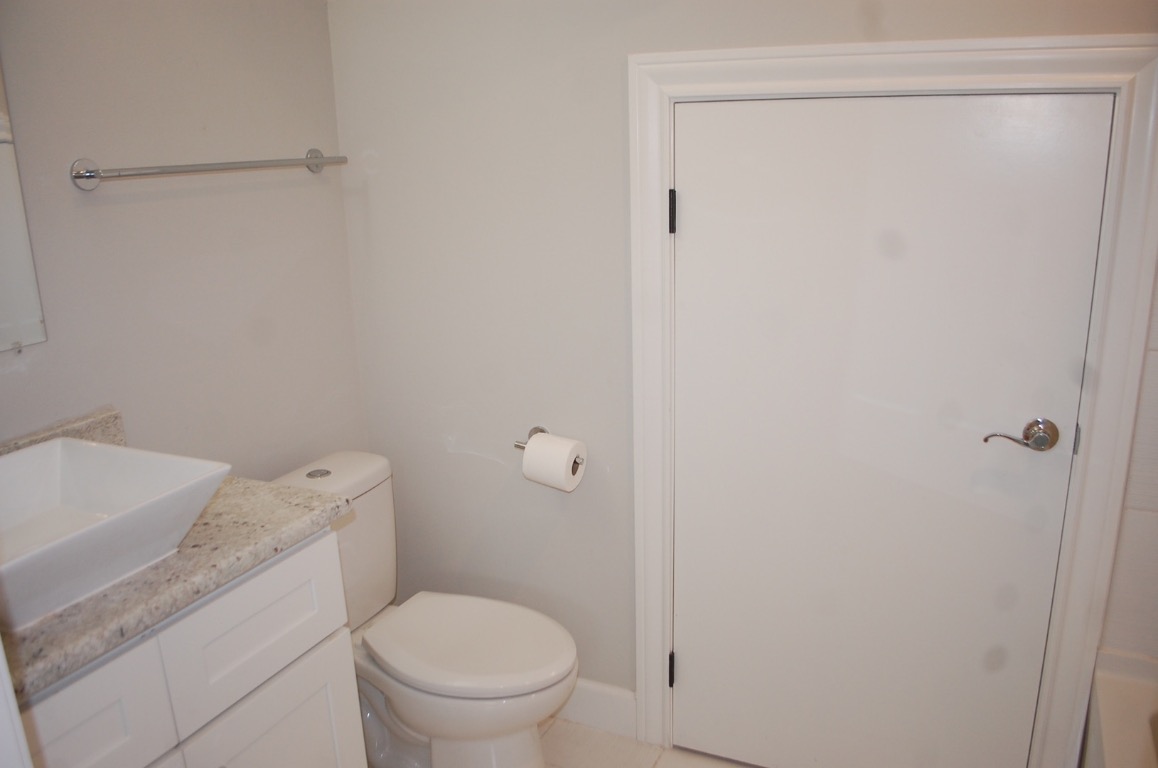 1707 Garden Street, Unit B Austin, TX 78702 - Photo 10 of 33 Bathroom featuring vanity and toilet