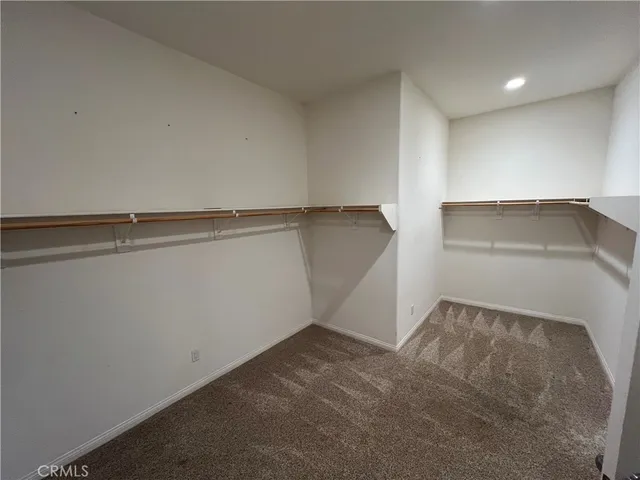a view of a room with an empty shelf