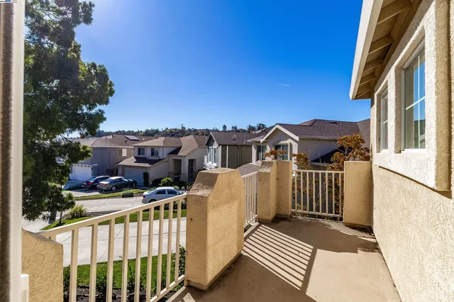 an aerial view of multiple houses with plants