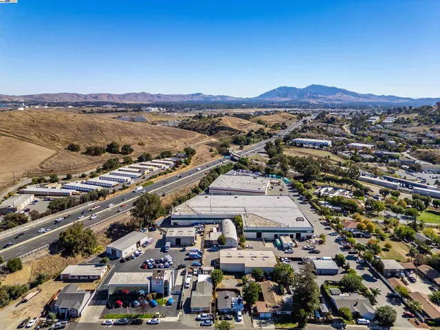 a view of street with houses
