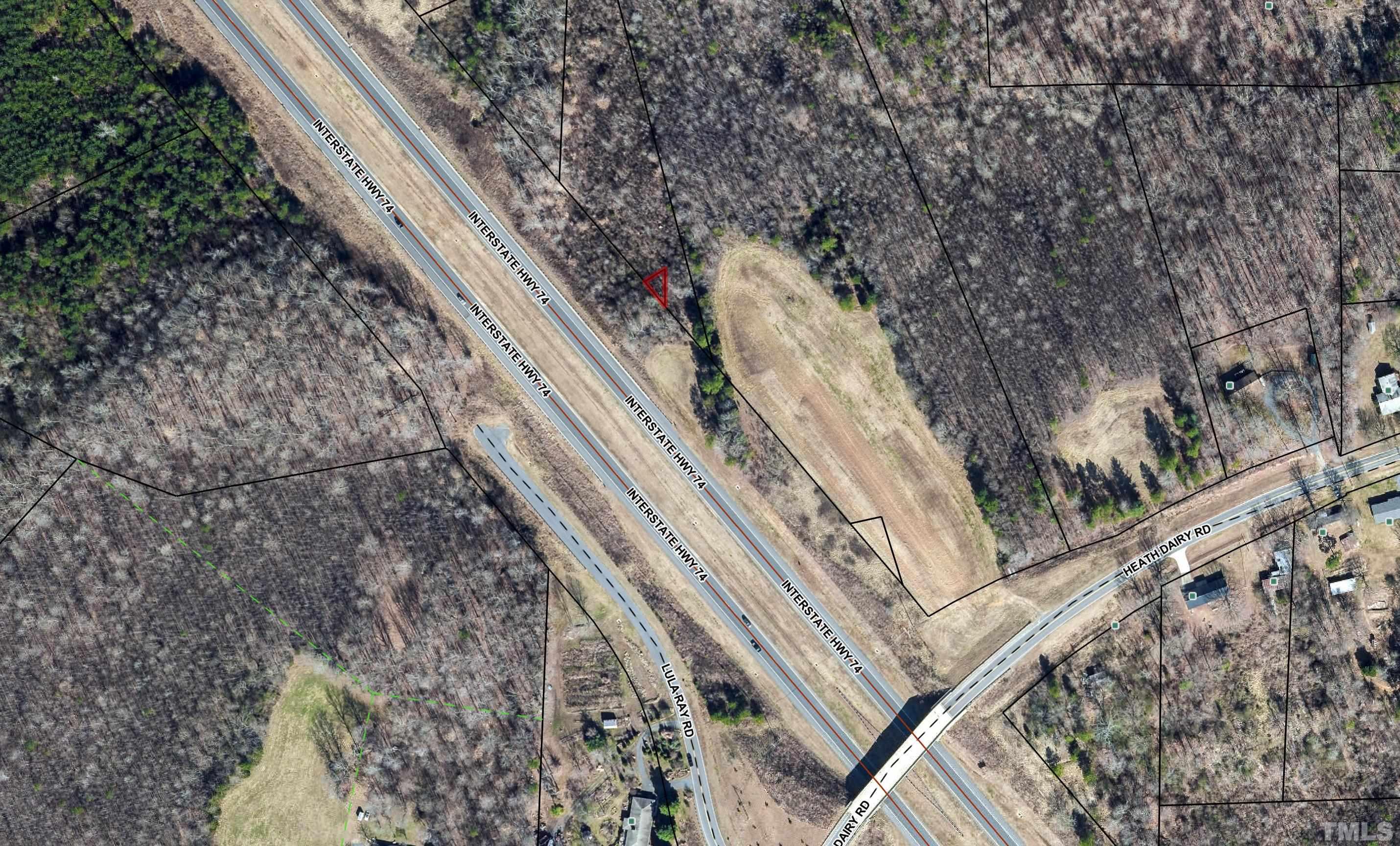 0 Heath Dairy Road Randleman, NC 27317 - Photo 2 of 3 a view of a yard with a tree