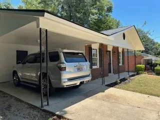 a car parked in front of a house