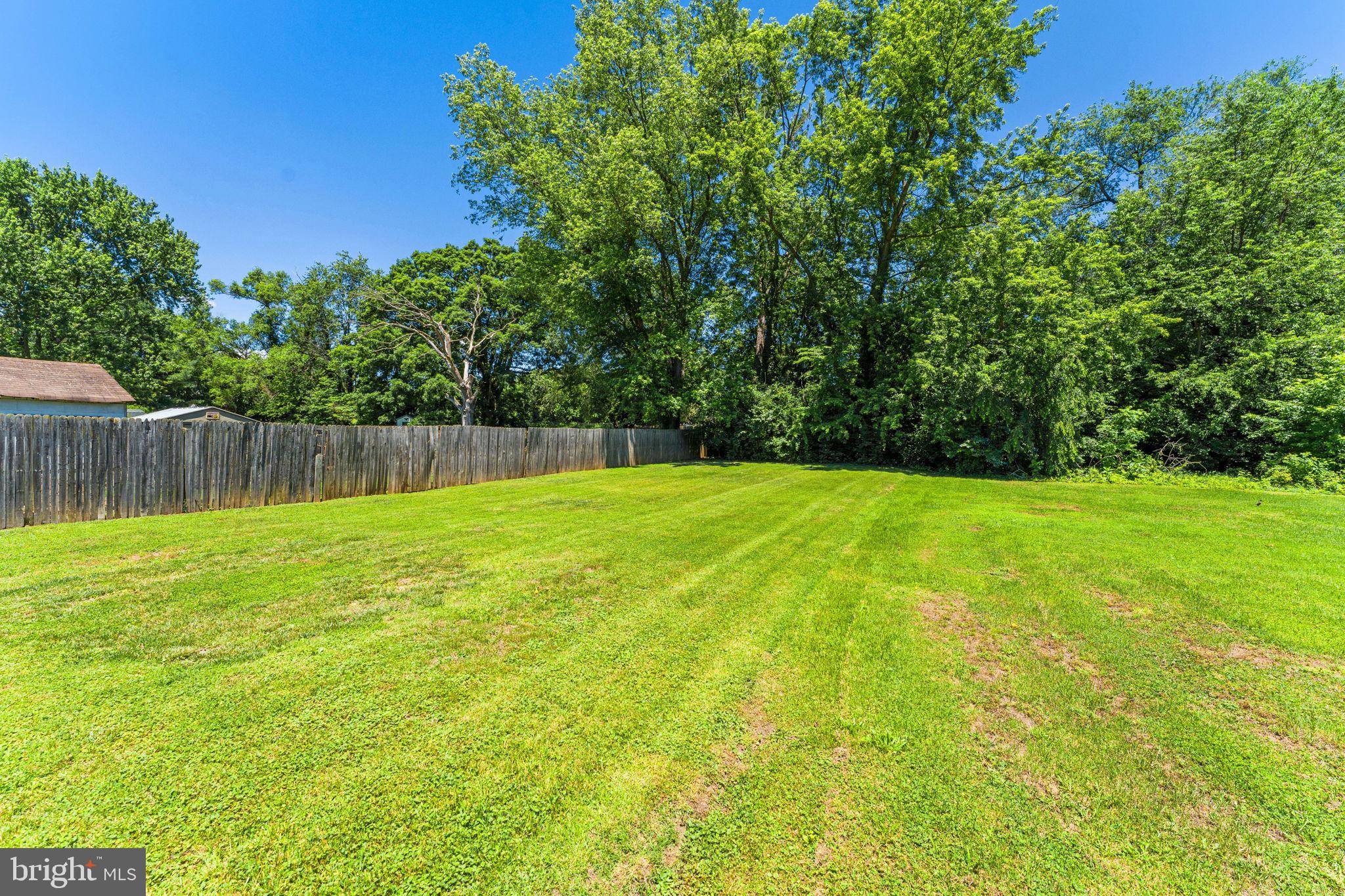 216 Walnut Street Berryville, VA 22611 - Photo 34 of 36 a view of swimming pool with wooden fence