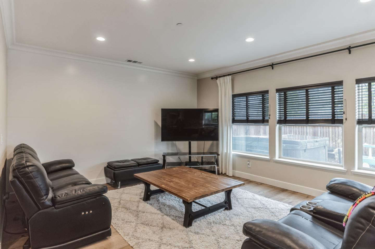 1471 Trinity Circle Hollister, CA 95023 - Photo 11 of 29 a living room with furniture and a flat screen tv