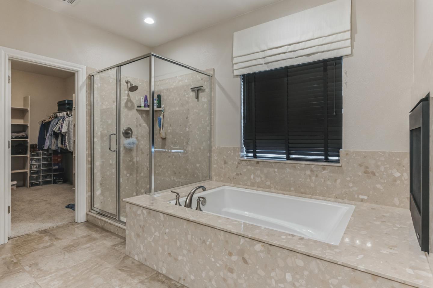 1471 Trinity Circle Hollister, CA 95023 - Photo 12 of 29 a spacious bathroom with a bathtub and a shower
