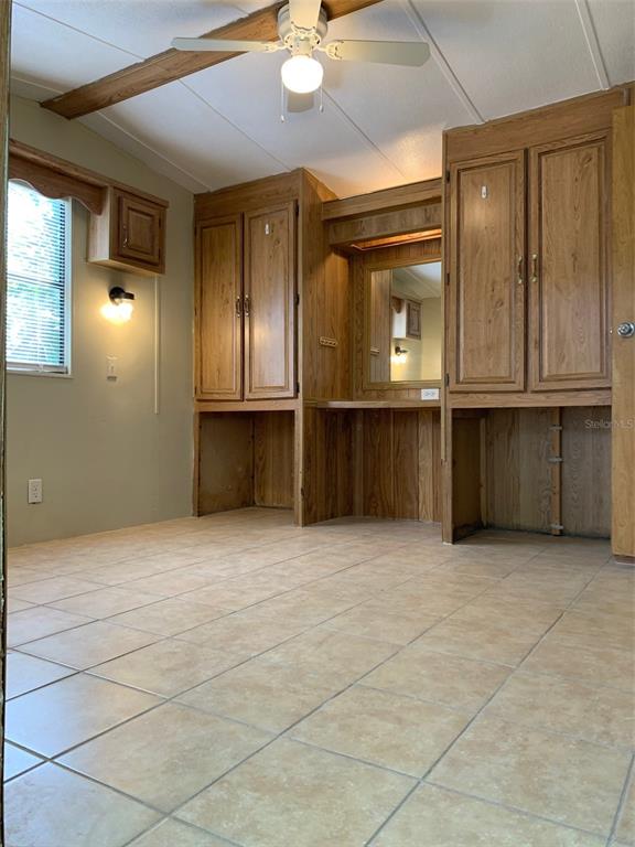 3000 Clarcona Road, Unit 723 Apopka, FL 32703 - Photo 12 of 14 a view of kitchen with cabinets
