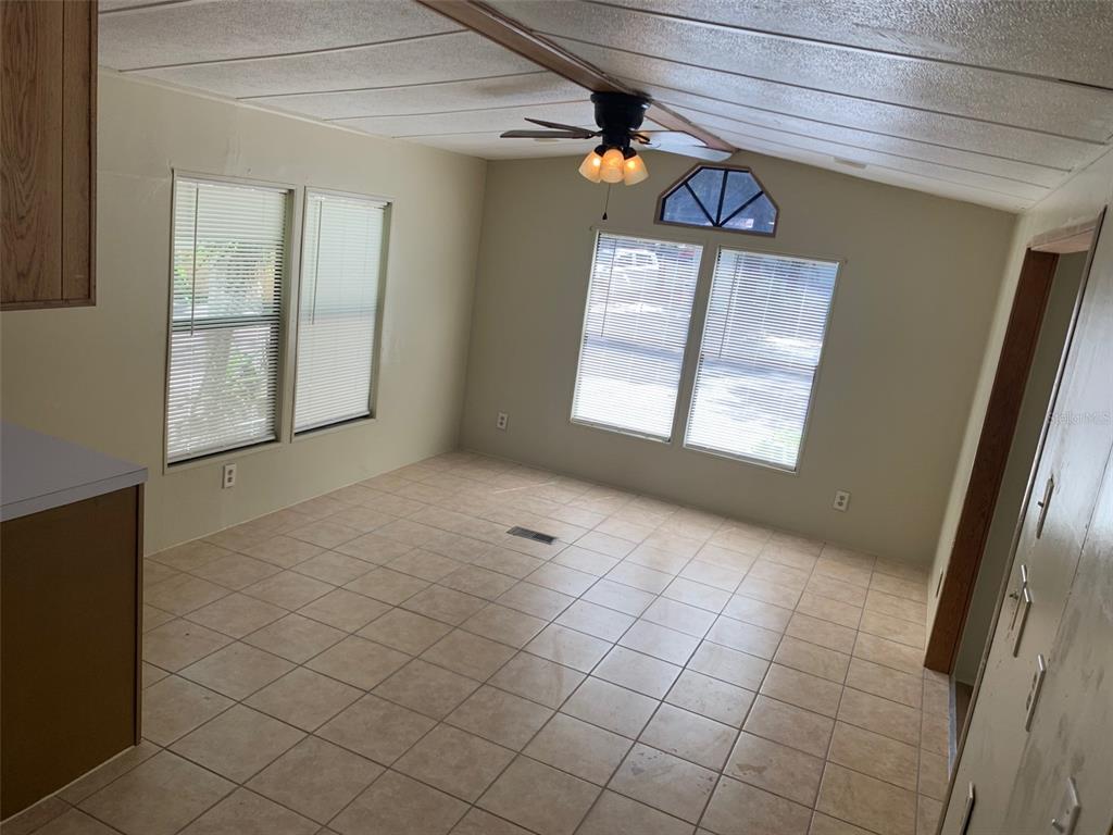 3000 Clarcona Road, Unit 723 Apopka, FL 32703 - Photo 3 of 14 an empty room with windows