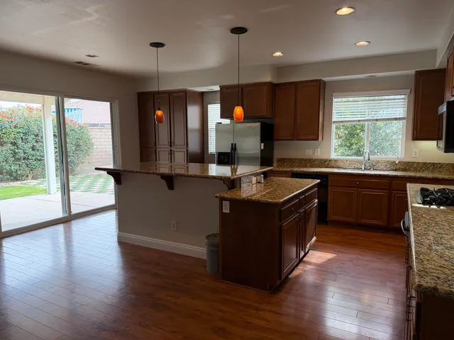 a kitchen with a sink counter top space and appliances
