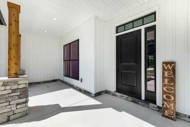 a view of an entryway with a room