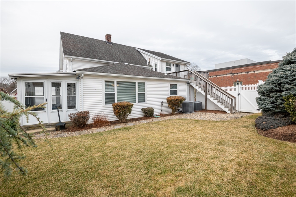 11 Linden Street Reading, MA 01867 - Photo 26 of 31 a view of a house with backyard and sitting area