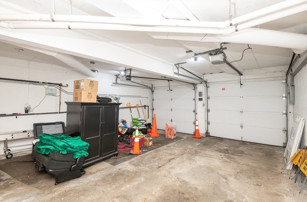 11 Linden Street Reading, MA 01867 - Photo 30 of 31 a view of storage and utility room with a washer and dryer