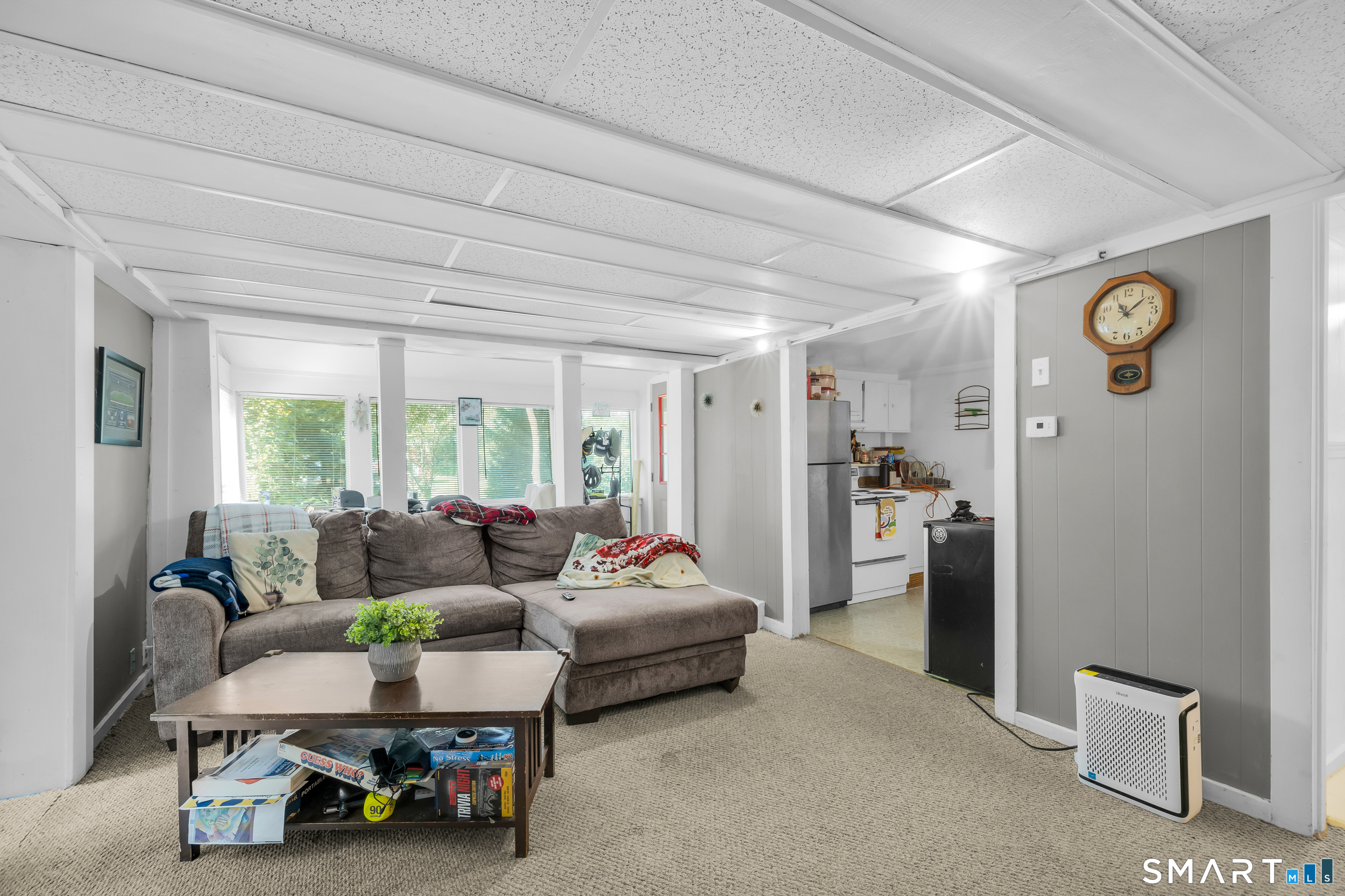90 Rowley Road Woodbury, CT 06798 - Photo 2 of 40 a living room with furniture and a large window
