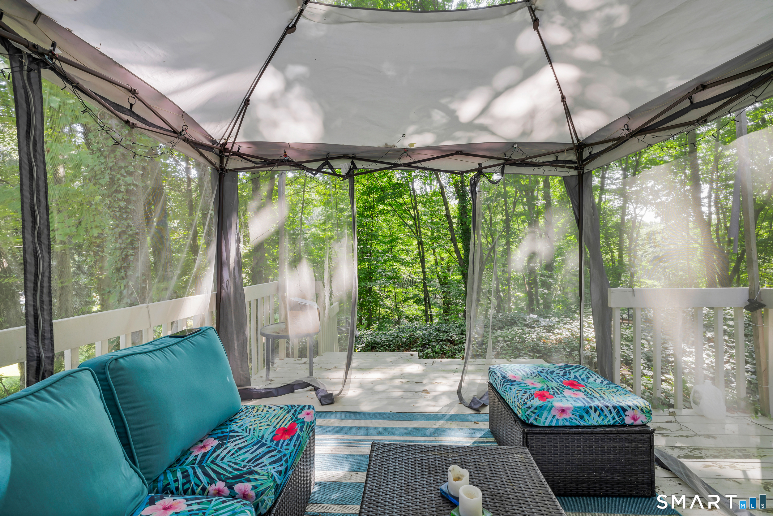 90 Rowley Road Woodbury, CT 06798 - Photo 26 of 40 a living room with furniture and a floor to ceiling window