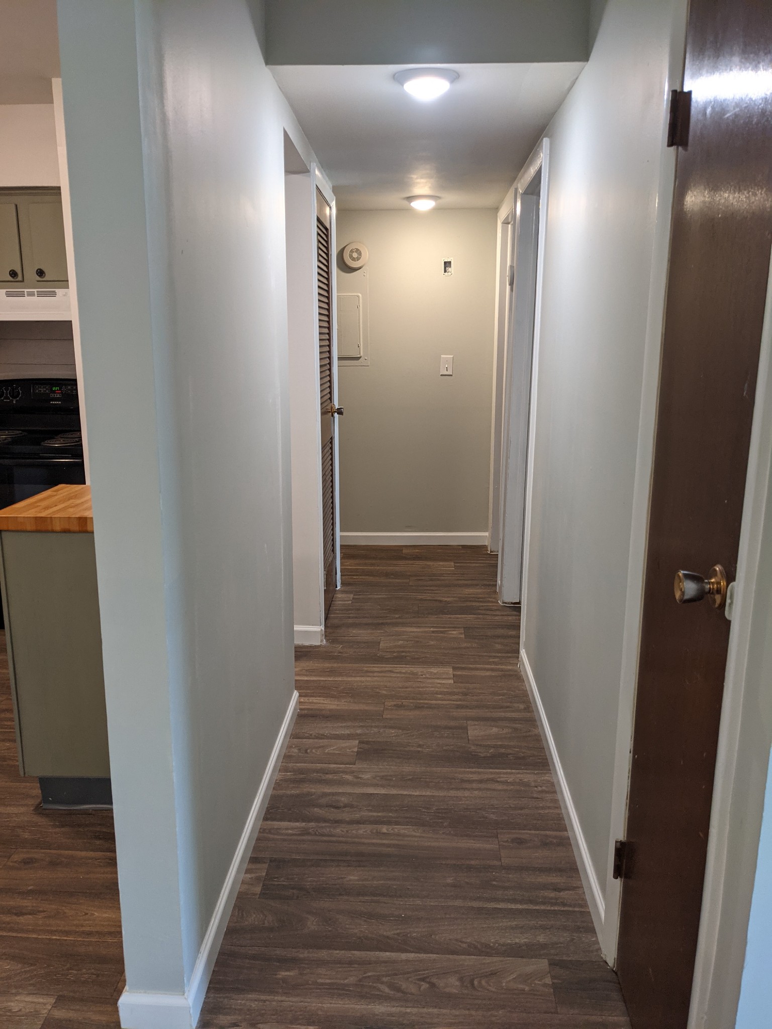 320 Welch Road, Unit F1 Nashville, TN 37211 - Photo 7 of 13 a view of hallway with wooden floor