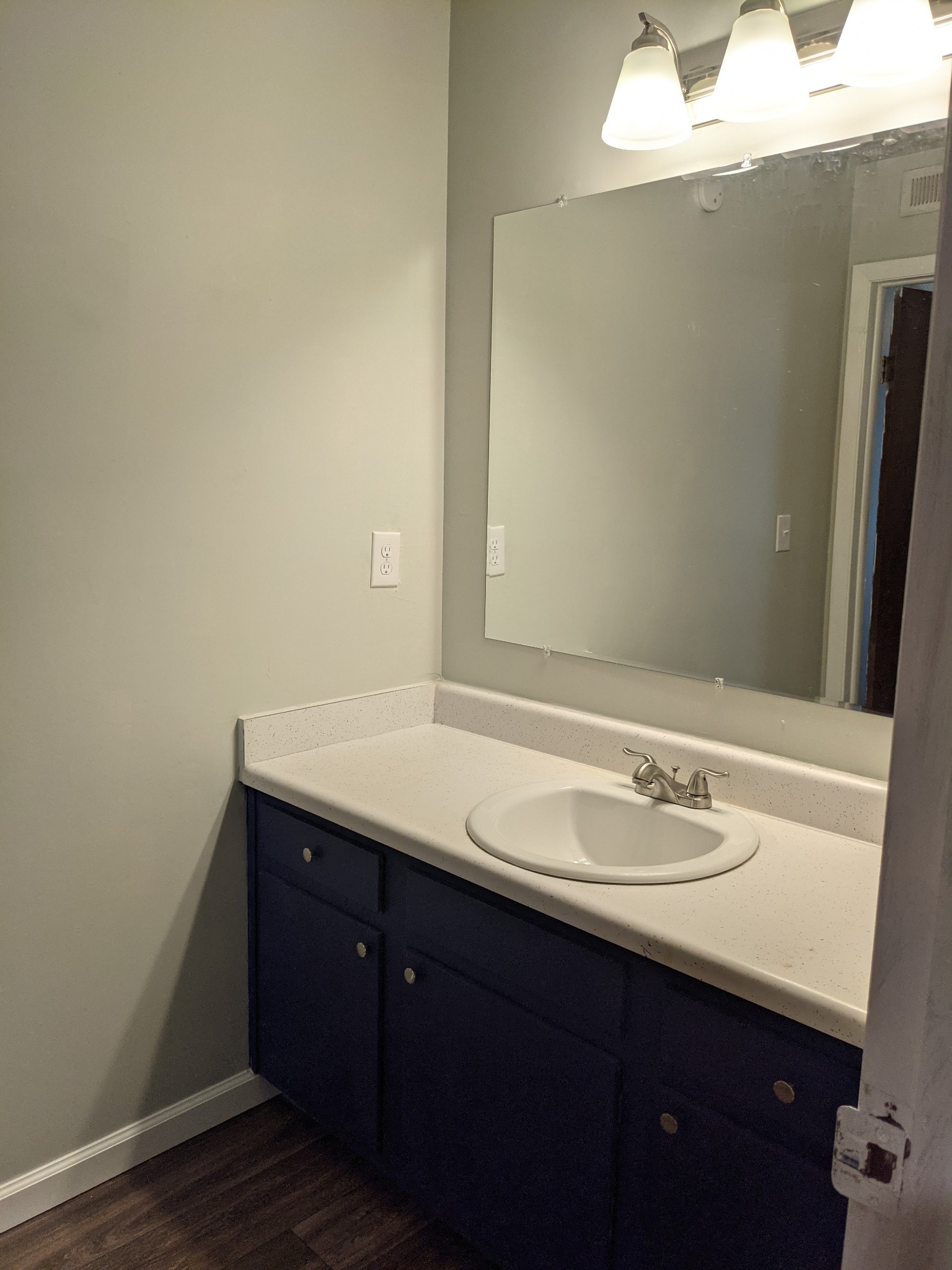 320 Welch Road, Unit F1 Nashville, TN 37211 - Photo 10 of 13 a bathroom with a sink and a mirror