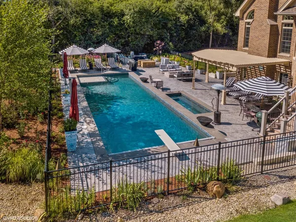 a view of a lake in the house and green space