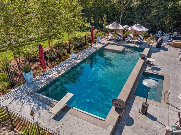 a view of a golf course with a lake