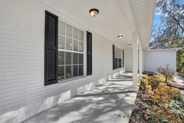 a view of a bedroom with windows
