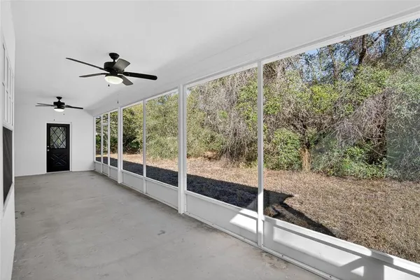 a view of a room with a large window