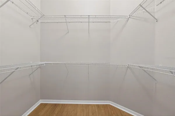 a view of a room with racks on the wall