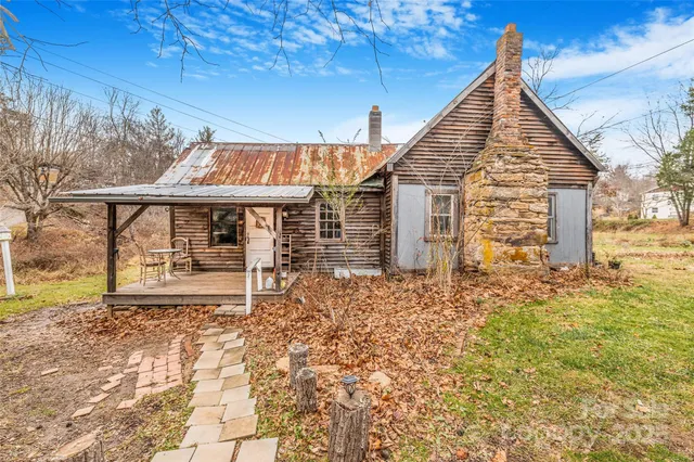 a front view of a house with a porch