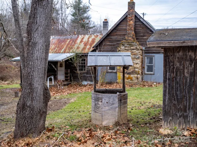 a view of a room with shelves on the wall