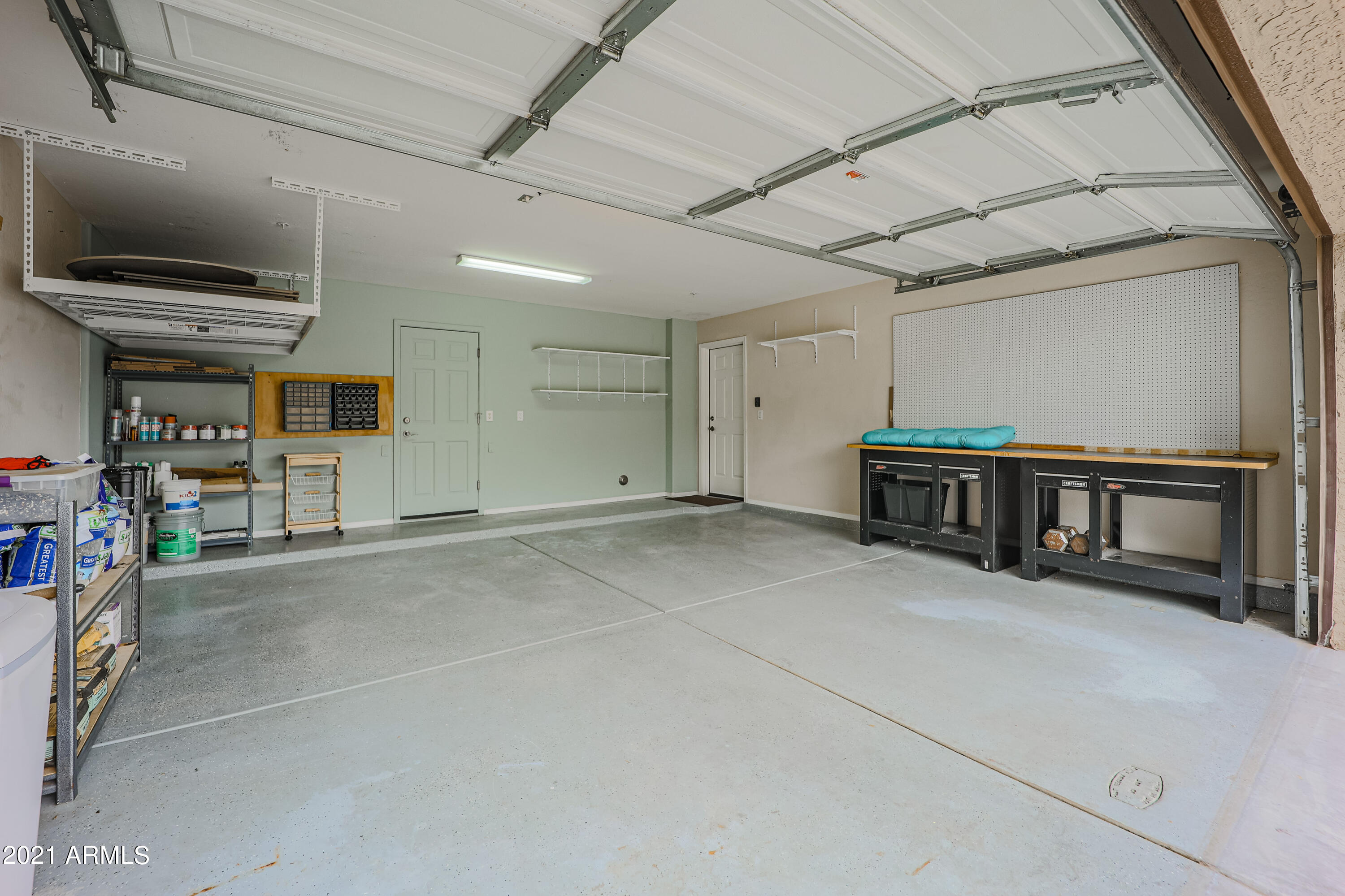 18556 Verdin Road Goodyear, AZ 85338 - Photo 42 of 63 2 Car Garage with water softner