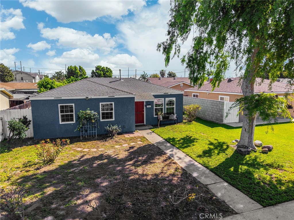 10542 Rose Street Stanton, CA 90680 - Photo 1 of 1 a view of a house with a swimming pool