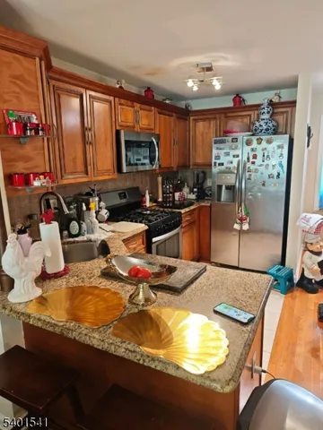 a room with furniture and a flat screen tv