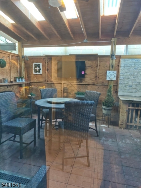 353 Adams Street Newark, NJ 07114 - Photo 13 of 13 a outdoor dining space with seating