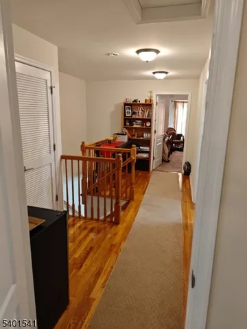 a very nice looking room with a large window and furniture